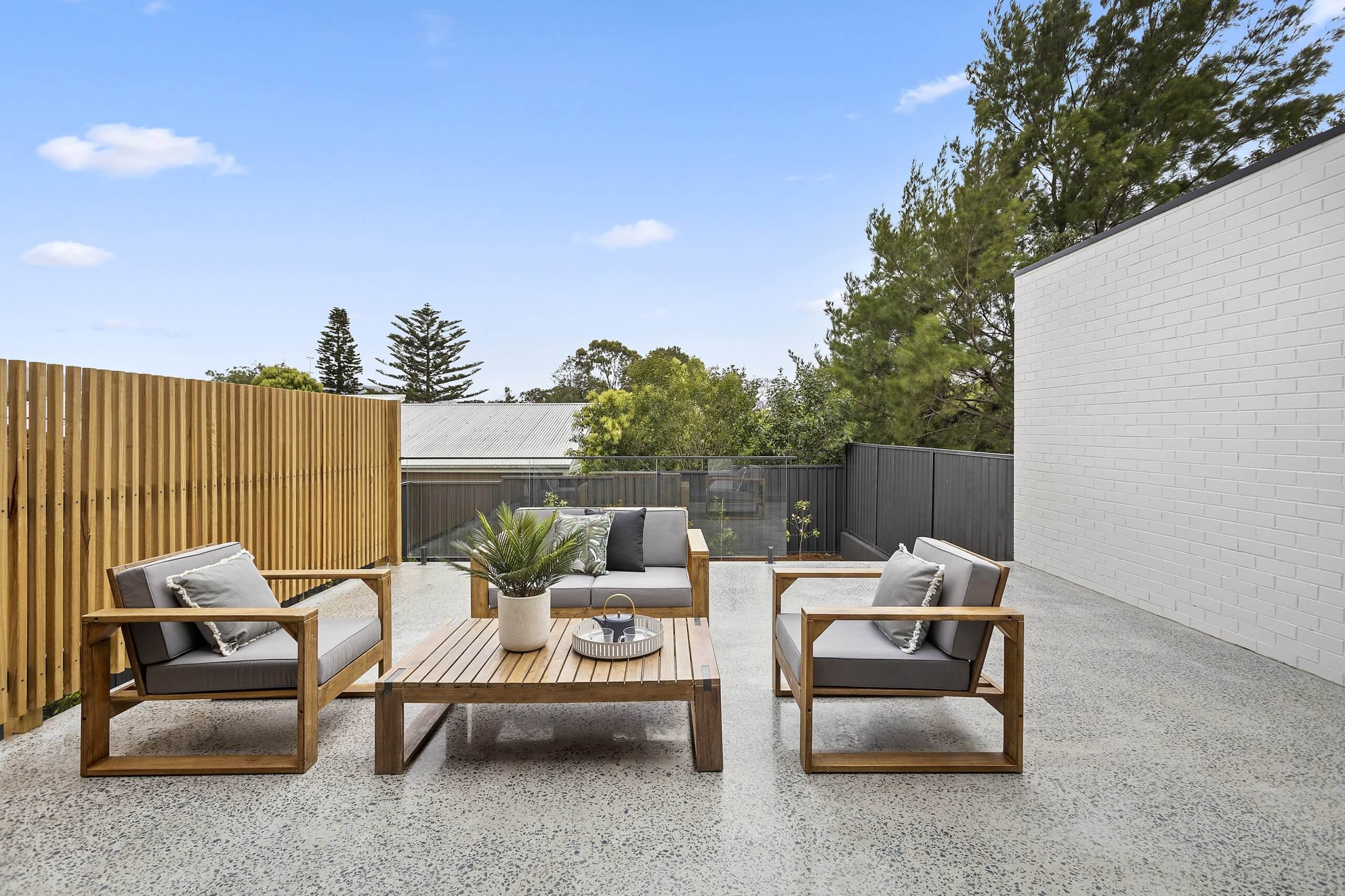 outdoor furniture on polished concrete flooring